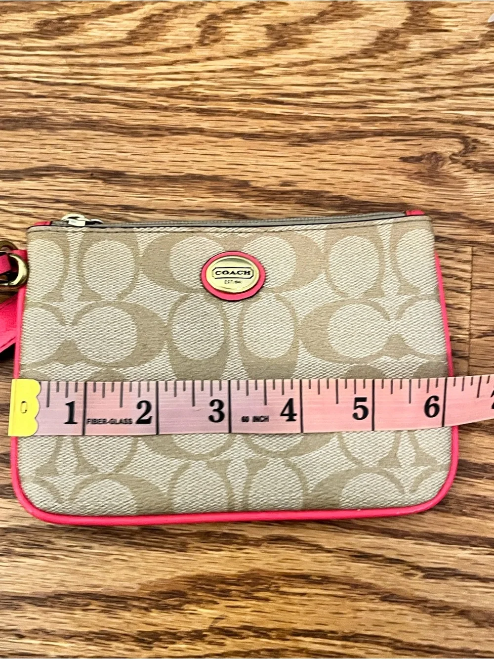 Coach Signature Canvas Wristlet with Coral Trim and Gold Hardware